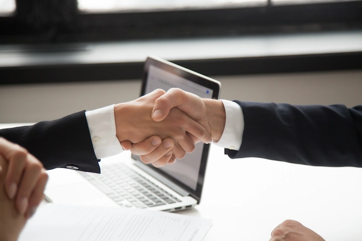 businessman-handshaking-businesswoman-showing-respect-closeup-view-hands-shaking